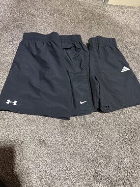 Lot of 3 boys black athletic shorts.